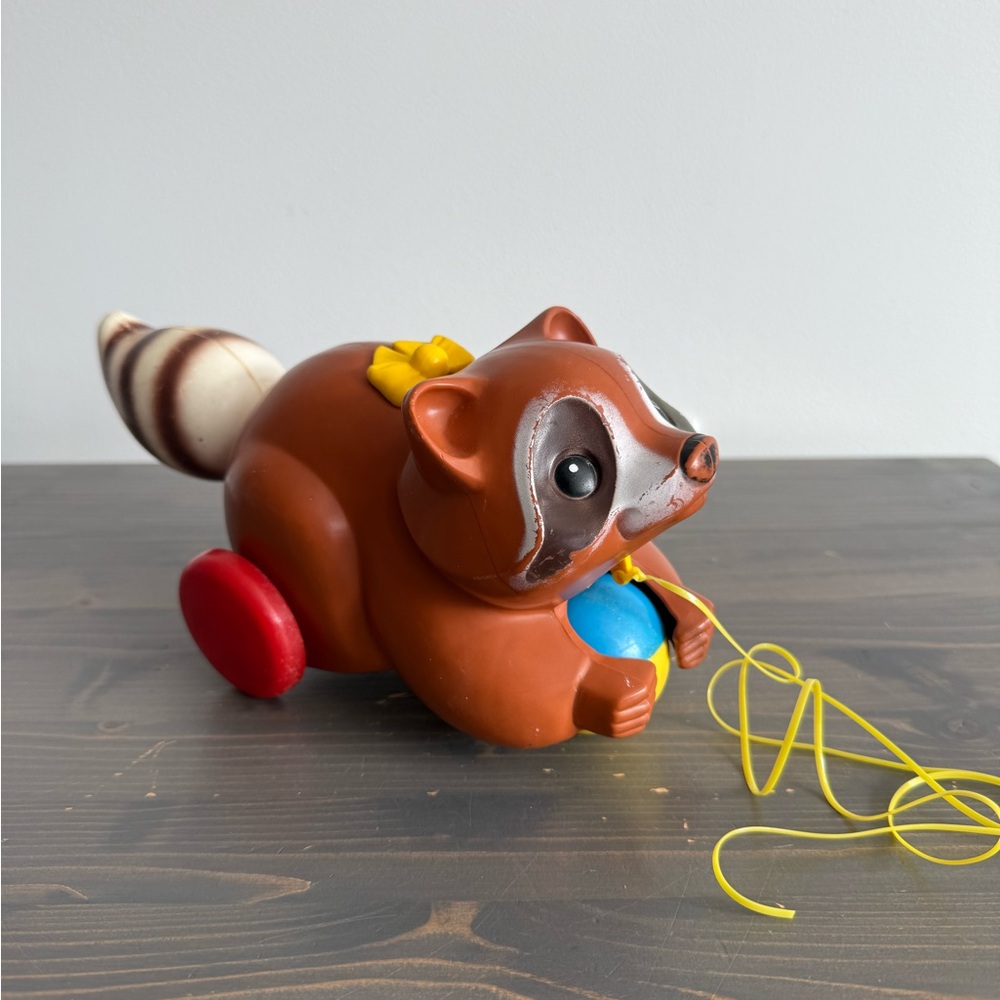 Vintage Fisher Price Roly racoon pull toy